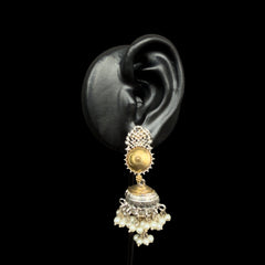 Classic Jhumka design with a modern twist.
Dual-tone silver & gold finish for effortless pairing.
Pearl embellishments add a touch of sophistication.
Lightweight, making them comfortable for all-day wear.