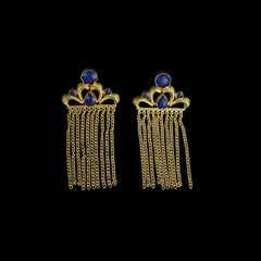 Exuding a regal aura, these earrings showcase a crown-like gold motif adorned with deep blue gemstones and cascading gold chains. The intricate detailing adds to their luxurious appeal.