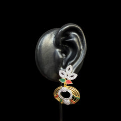 Step into a world of grace with the Royal Peacock Enamel Earrings. Inspired by nature’s most vibrant bird, these earrings showcase a peacock motif with intricate enamel work and shimmering embellishments.