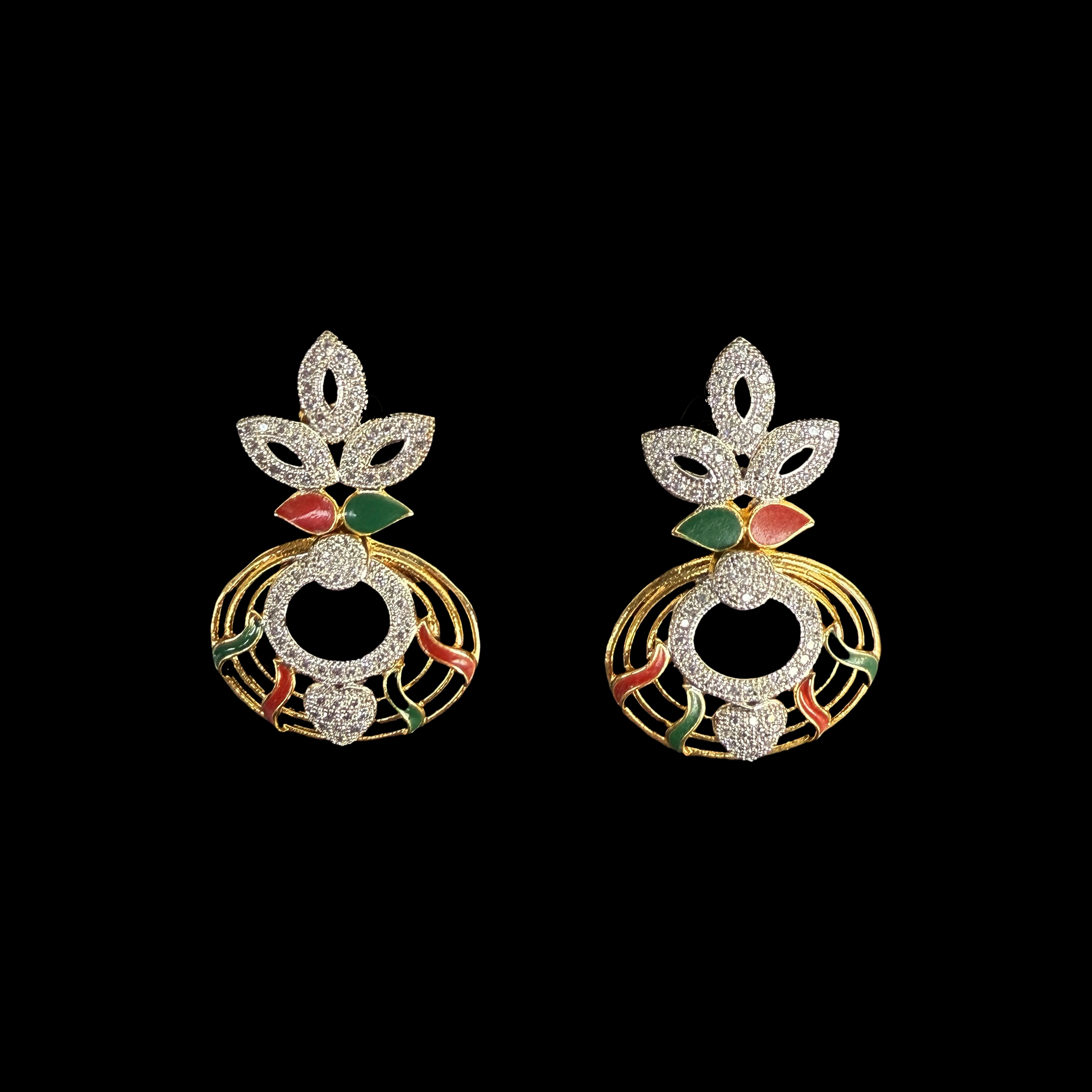 Step into a world of grace with the Royal Peacock Enamel Earrings. Inspired by nature’s most vibrant bird, these earrings showcase a peacock motif with intricate enamel work and shimmering embellishments.