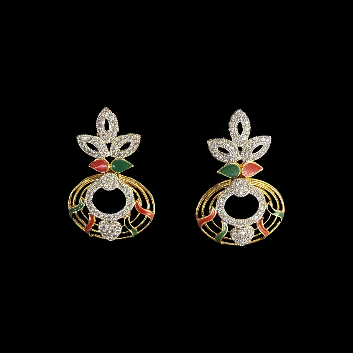 Step into a world of grace with the Royal Peacock Enamel Earrings. Inspired by nature’s most vibrant bird, these earrings showcase a peacock motif with intricate enamel work and shimmering embellishments. 