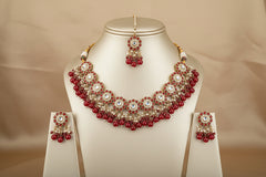 Gold-Plated Kundan Styled Maroon Necklace Set with Maang Tikka